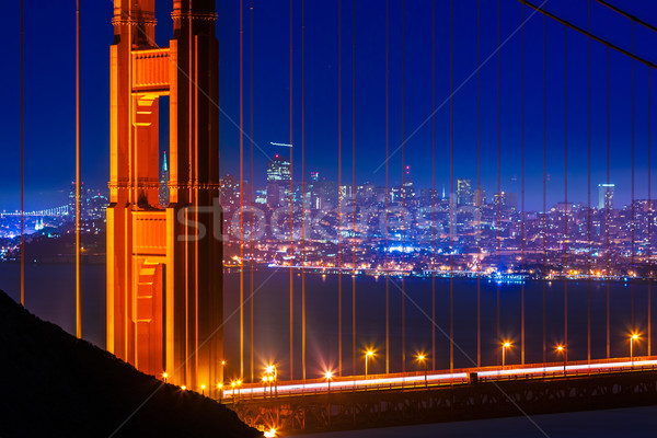 Golden Gate Bridge San Francisco sunset through cables Stock photo © lunamarina