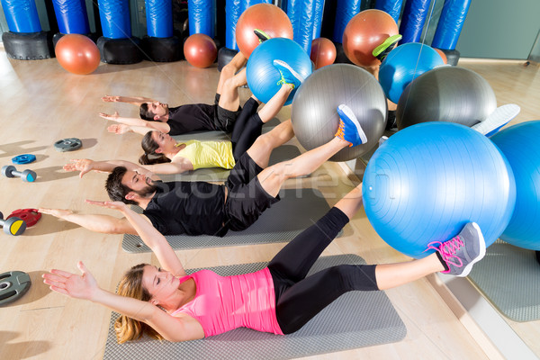 Fitball crunch training group core fitness at gym Stock photo © lunamarina