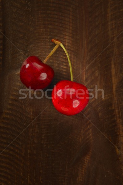 Cherry red fruits over dark wooden Stock photo © lunamarina