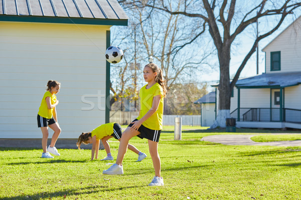 Ami filles adolescents jouer football football [[stock_photo]] © lunamarina