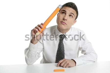 Fiatal üzletember diák gondolkodik ceruza kézmozdulat Stock fotó © lunamarina
