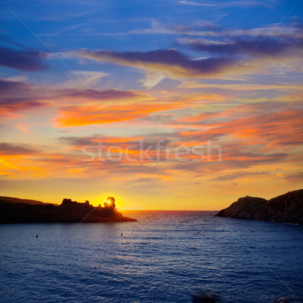 Menorca sunset in Cala Morell at Ses torretes beach Stock photo © lunamarina