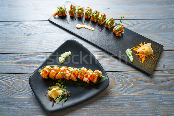 Dragon shape Sushi rice roll Stock photo © lunamarina