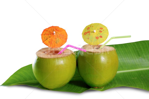 coconut beverage straw cocktail on banana tree leaf Stock photo © lunamarina
