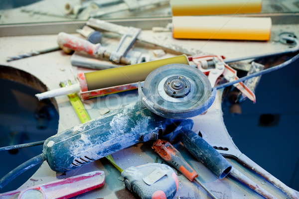 home improvement  messy clutter with dusted tools Stock photo © lunamarina