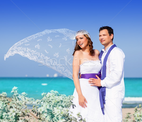 Couple in wedding day on beach sea Stock photo © lunamarina