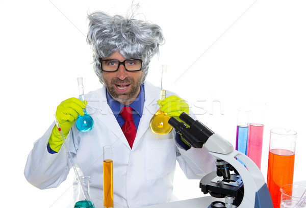 Crazy nerd scientist silly man on chemical laboratory Stock photo © lunamarina