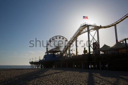 Santa Moica pier Ferris Wheel at sunset in California Stock photo © lunamarina