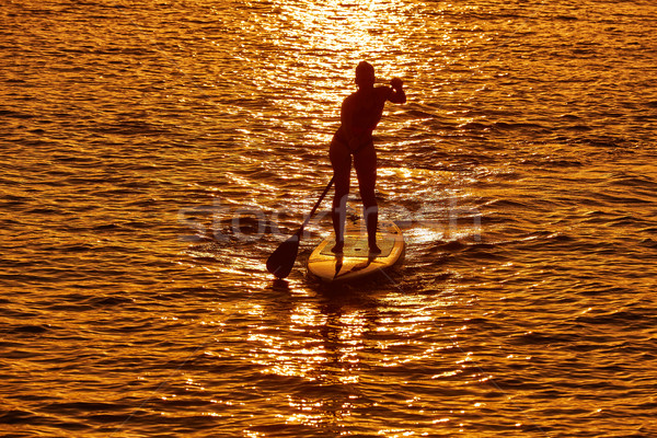 Stand up surf ragazza acqua felice Foto d'archivio © lunamarina