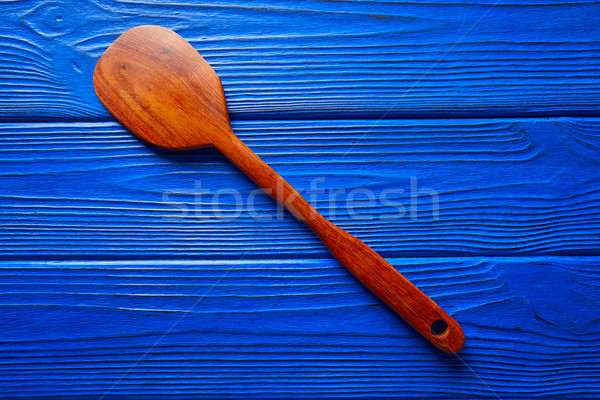 Chef spatula on a blue wooden background Stock photo © lunamarina