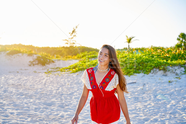 Happy latin beautiful girl walking in caribbean Stock photo © lunamarina
