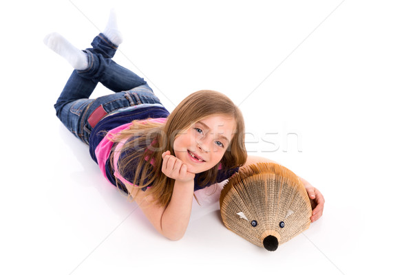 Blond kid girl student with hedgehog book Stock photo © lunamarina