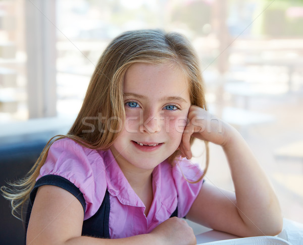 Blond relaxed happy kid girl expression blue eyes Stock photo © lunamarina