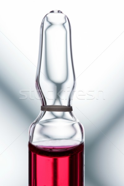 Glass ampoule with red liquid medicine Stock photo © lunamarina