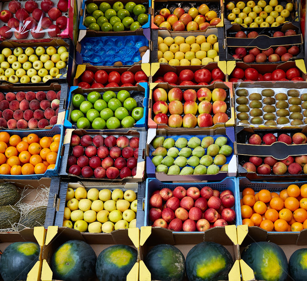 Fruits background in boxes display at market Stock photo © lunamarina