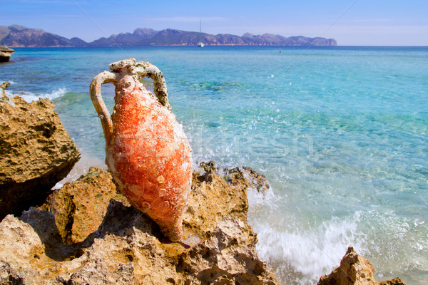 Alcudia Beach Mallorca with roman amphora Stock photo © lunamarina