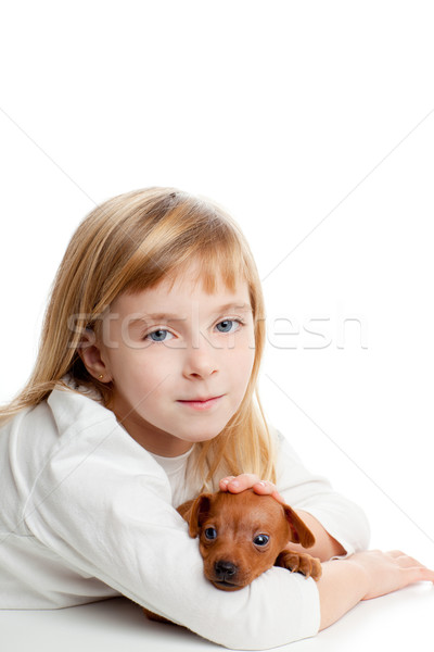 blond kid girl with mini pinscher pet mascot dog Stock photo © lunamarina