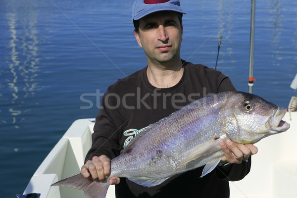 Foto stock: Pescador · orgulloso · de · agua · salada · peces