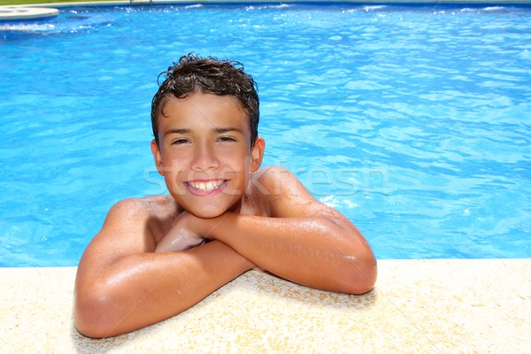 Menino feliz adolescente férias piscina azul Foto stock © lunamarina