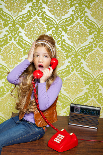 kid girl retro talking busybody in red telephone Stock photo © lunamarina