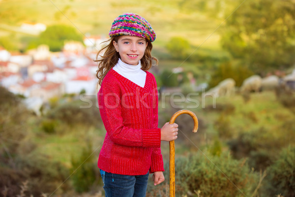 Kid girl shepherdess with wooden baston in Spain village Stock photo © lunamarina