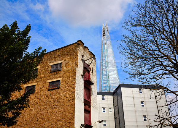 London shard view from old brick buildings Stock photo © lunamarina