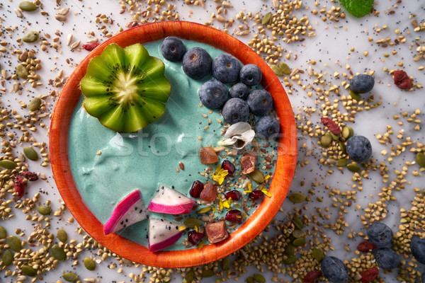 Acai bowl smoothie with kiwi blueberry seeds Stock photo © lunamarina