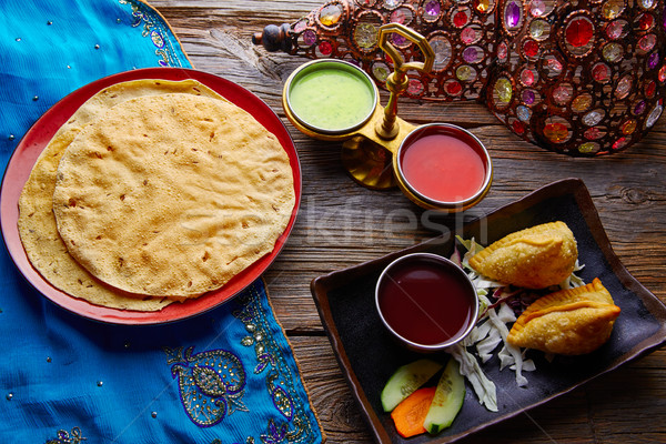 Samosas with Papadam red green sauces Stock photo © lunamarina