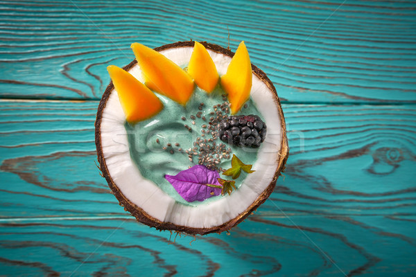 Spirulina bowl smoothie in coconut blackberry mango Stock photo © lunamarina