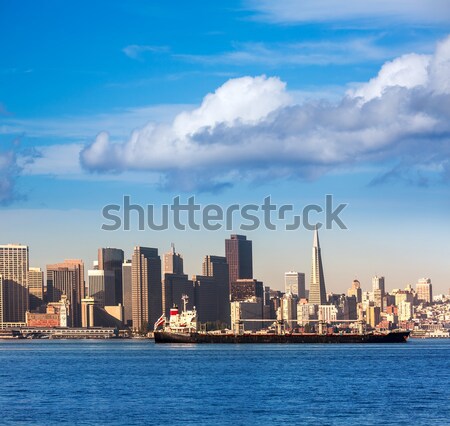 San francisco Skyline with merchant ship cruising bay at Califor Stock photo © lunamarina