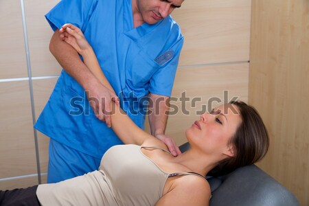 cranial osteopathy therapy doctor hands in woman head Stock photo © lunamarina