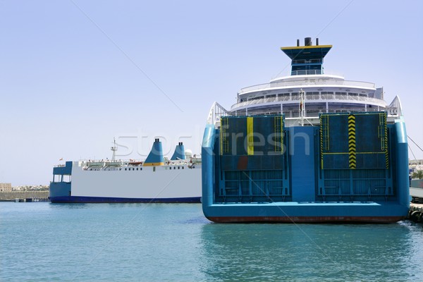 Blue passenger and cargo boats on Ibiza Stock photo © lunamarina