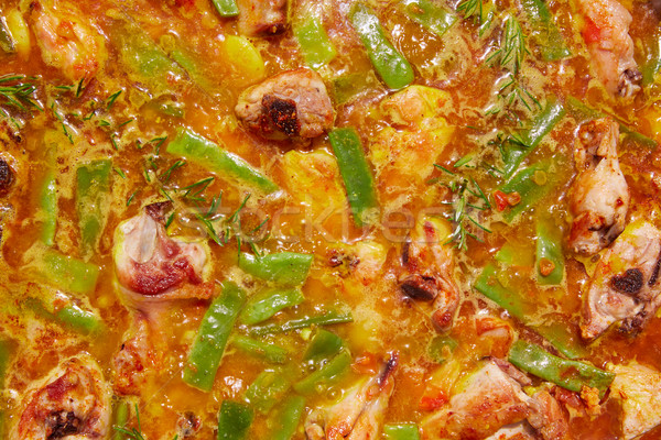 Paella from Spain recipe process boiling broth Stock photo © lunamarina