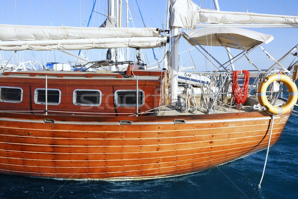 Stock photo: beautiful wooden sailboat on blue sea