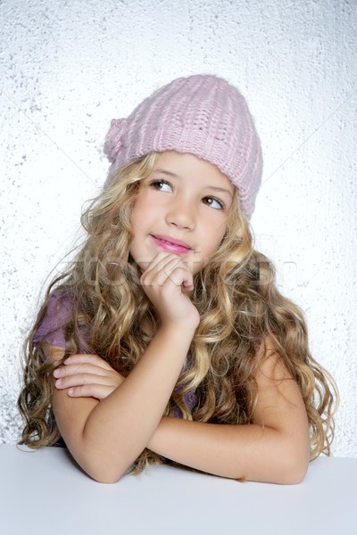 Stock photo: Smiling gesture little girl winter pink cap portrait