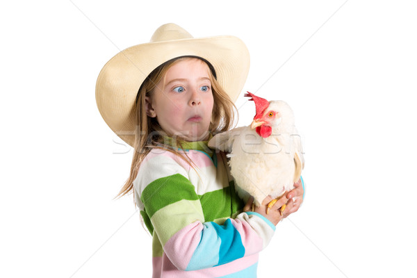Funny kid girl expression surprised gesture scared of hen Stock photo © lunamarina