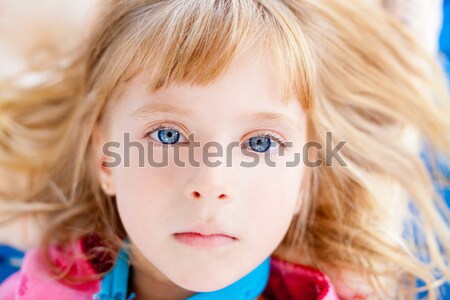 girl lying on pillow toddler looking camera Stock photo © lunamarina