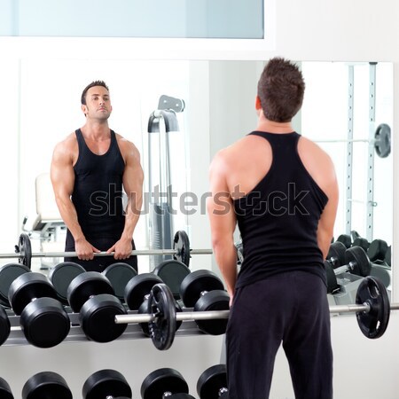 Tornaterem pár súlyzó súlyok fitnessz evezős Stock fotó © lunamarina