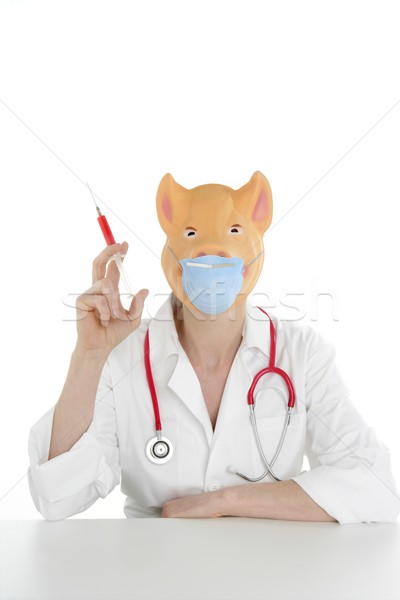 Doctor with pig mask and red syringe Stock photo © lunamarina