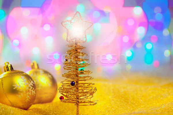 Stock photo: Christmas golden tree with baubles and lights