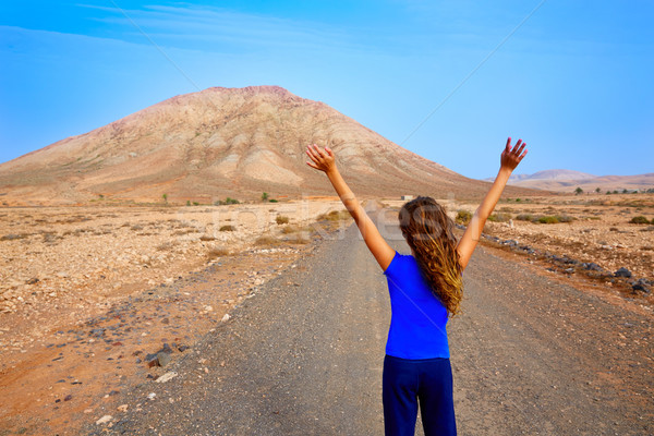 Fuerteventura girl in Tindaya mountain at Canary Stock photo © lunamarina