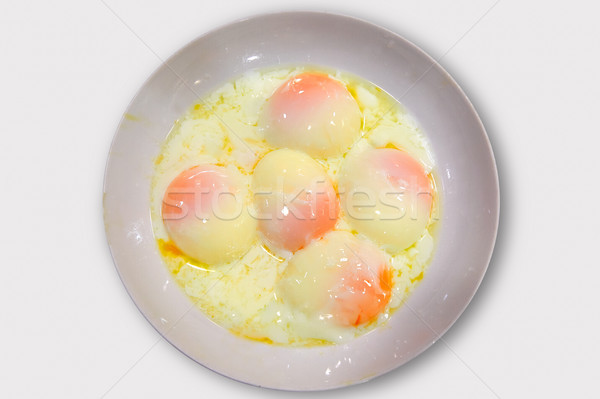 Scazut temperatura lent gătit ouă modern Imagine de stoc © lunamarina