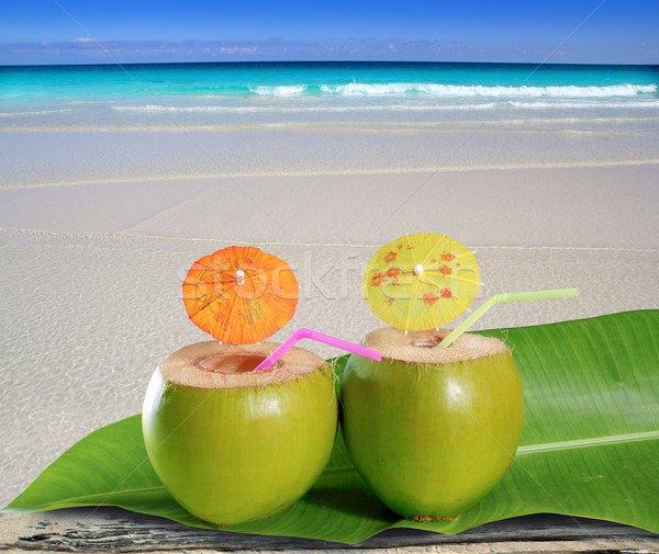 Stock photo: fresh tender green coconuts straw beach cocktails