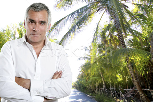 caribbean tourist senior man shirt palm trees jungle Stock photo © lunamarina