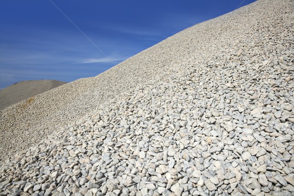 gravel gray mound quarry stock blue sky Stock photo © lunamarina