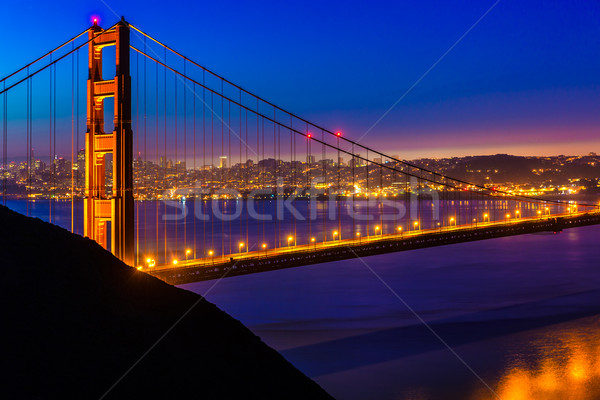 San Francisco Golden Gate Bridge sunset through cables Stock photo © lunamarina