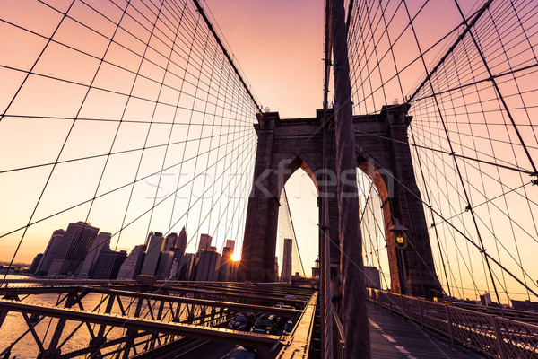 Brooklyn Bridge sunset with Manhattan skyline US Stock photo © lunamarina