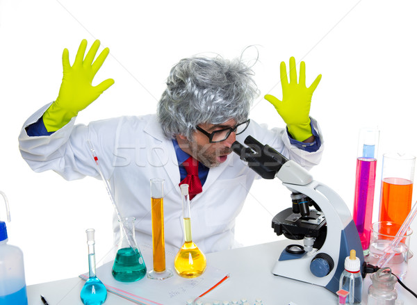 Nebun nebun tocilar om de ştiinţă laborator microscop Imagine de stoc © lunamarina