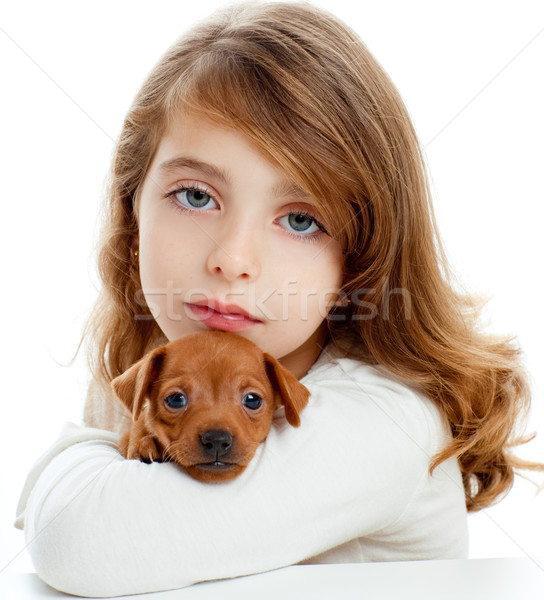 Brunette girl with puppy dog mini pinscher Stock photo © lunamarina