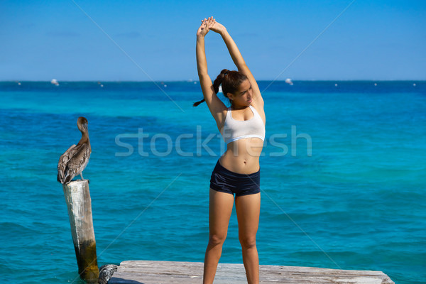 運動員 女子 加勒比的 海灘 碼頭 商業照片 © lunamarina